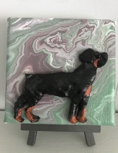 Rottweiler and Painting